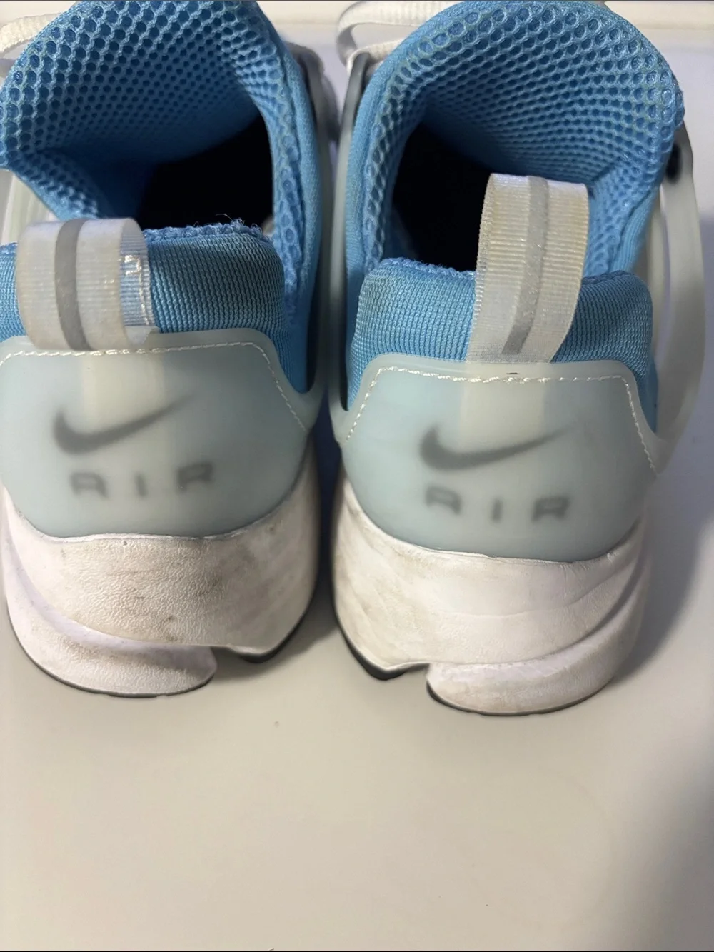 Men’s Nike  Light Blue and White Athletic Sneakers with Black Swoosh
